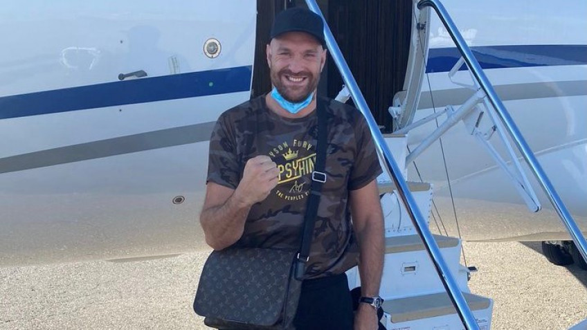 Кадр дня: Тайсон Фьюри прилетел в США